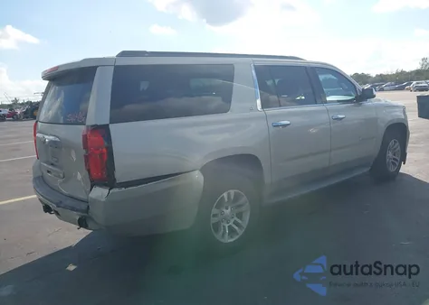 2015 Chevrolet Suburban 1500 Lt from USA, damaged, VIN 1GNSCJKC9FR595486